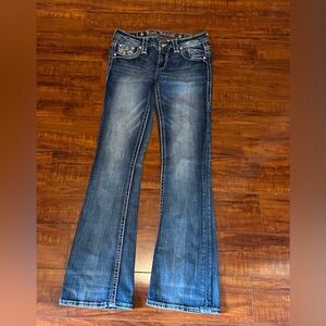 Rock Revival Dark Blue Flare Jeans are a size 27.